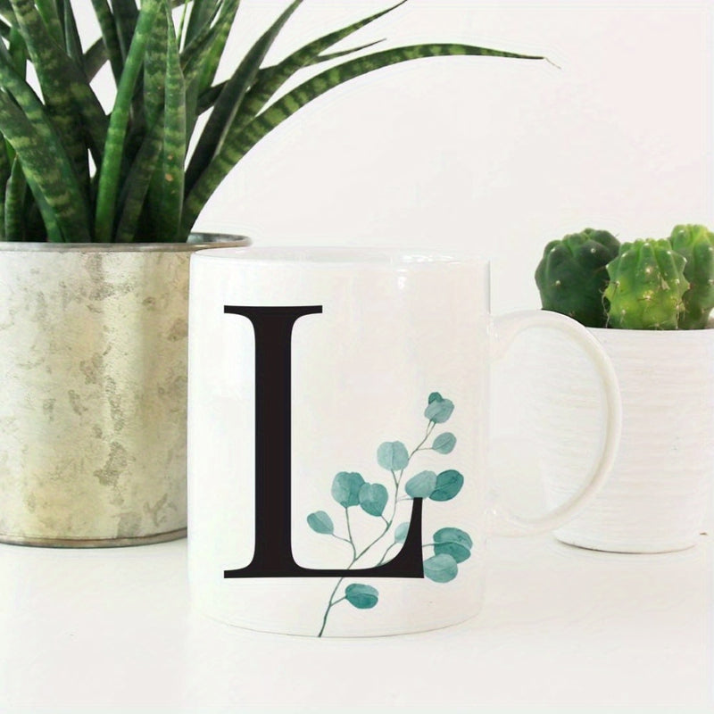 Tailorly White Ceramic 11 oz Mug - L Delicate Green Eucalyptus Foliage With Artistic Branches Behind Capital Letter Leaf