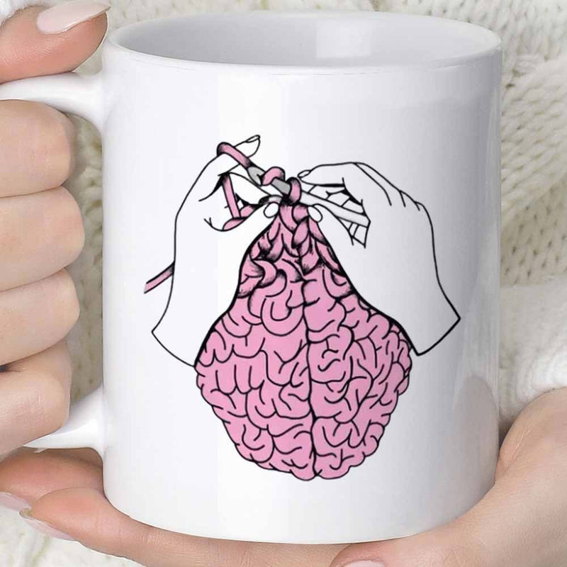 Tailorly White Ceramic 11 oz Mug - Graceful Human Hands Crocheting Pink Soft Yarn Into A Detailed Brain