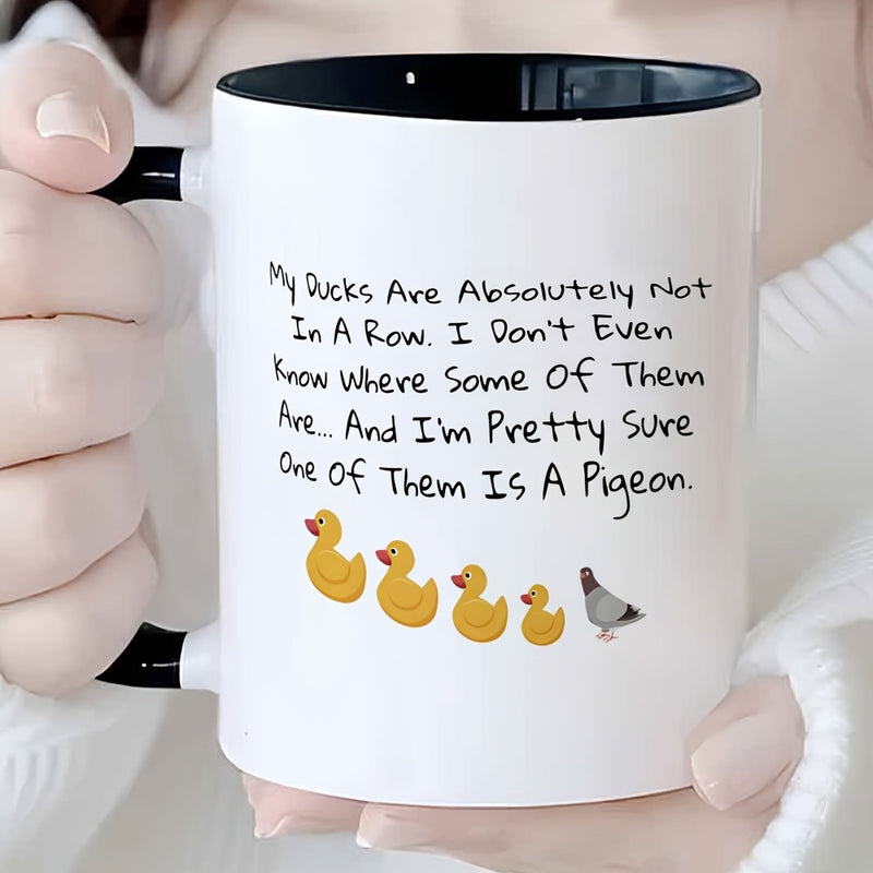 Tailorly Black Accent 11 oz Mug - duck pun "my ducks are in a row" with one penguin