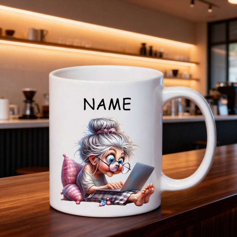 Tailorly White Ceramic 11 oz Mug - Name Quirky Elderly Woman Typing On Laptop While Resting Against Large Pink Pillow Grandmother