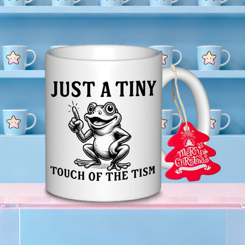 Tailorly White Ceramic 11 oz Mug - Just A Tiny Touch Of The Tism Whimsical Sitting Amphibian With A Smiling Expression And Pointing Hand Frog