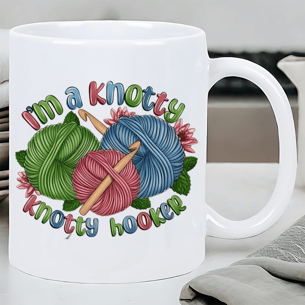 Tailorly White Ceramic 11 oz Mug - Im A Knotty Knotty Hooker Colorful Yarn Balls With Wooden Crochet Hooks And Pink Flowers Yarn