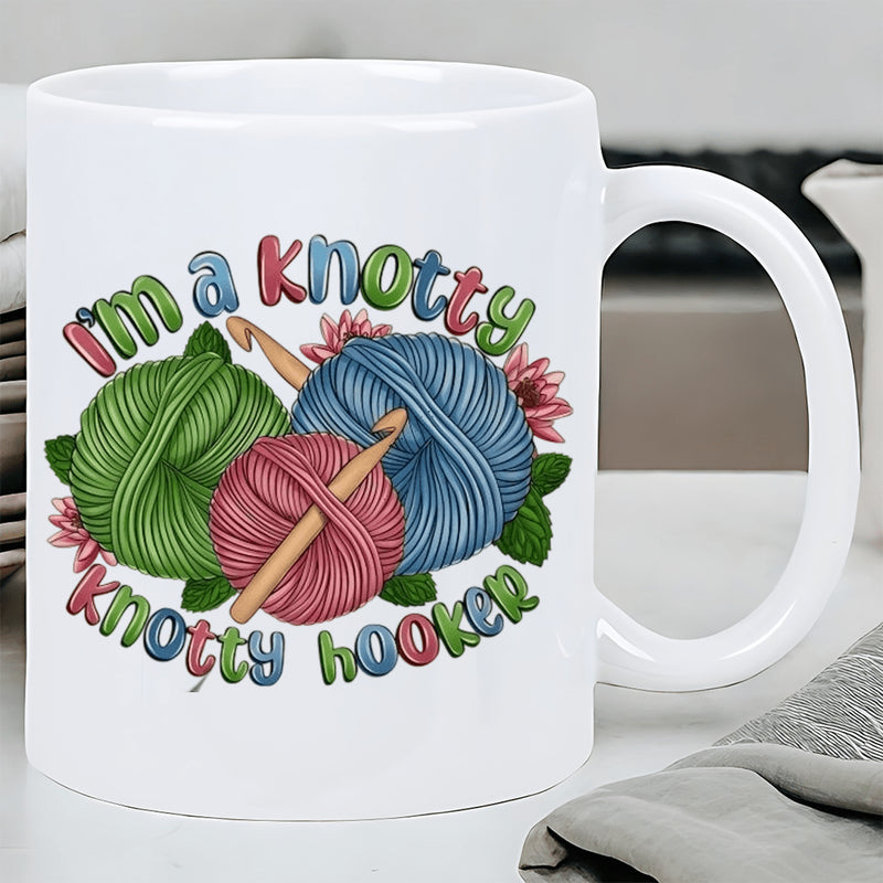 Tailorly White Ceramic 11 oz Mug - Im A Knotty Knotty Hooker Colorful Yarn Balls With Wooden Crochet Hooks And Pink Flowers Yarn