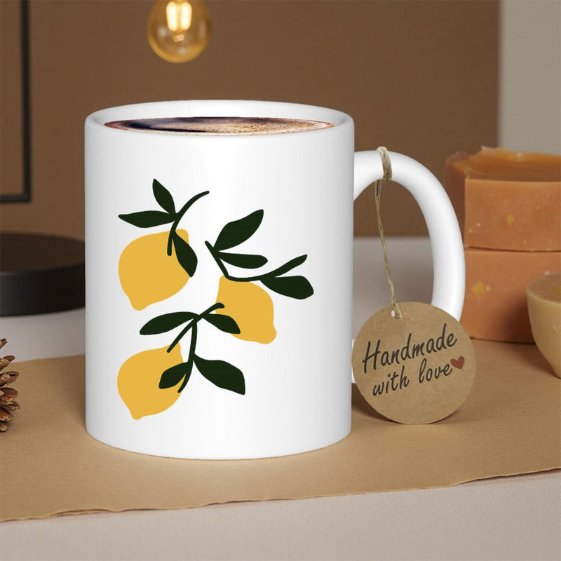 Tailorly White Ceramic 11 oz Mug - Vibrant Yellow Citrus Fruit With Deep Green Leaves On White Background Lemon