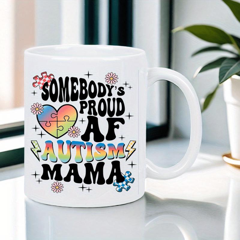 Tailorly White Ceramic 11 oz Mug - Somebody Proud AF Autism Mama Vibrant Rainbow Puzzle Heart Surrounded By Glowing Lightning Bolts And Stars Heart