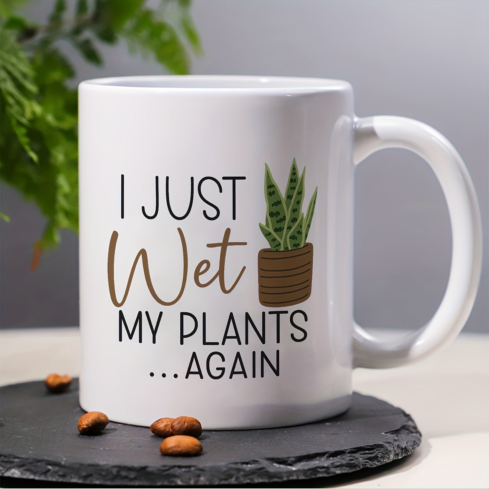 Tailorly White Ceramic 11 oz Mug - I Just Wet My Plants Again Green Pointed Leaves Inside Textured Brown Pot Beside Funny Text Plant