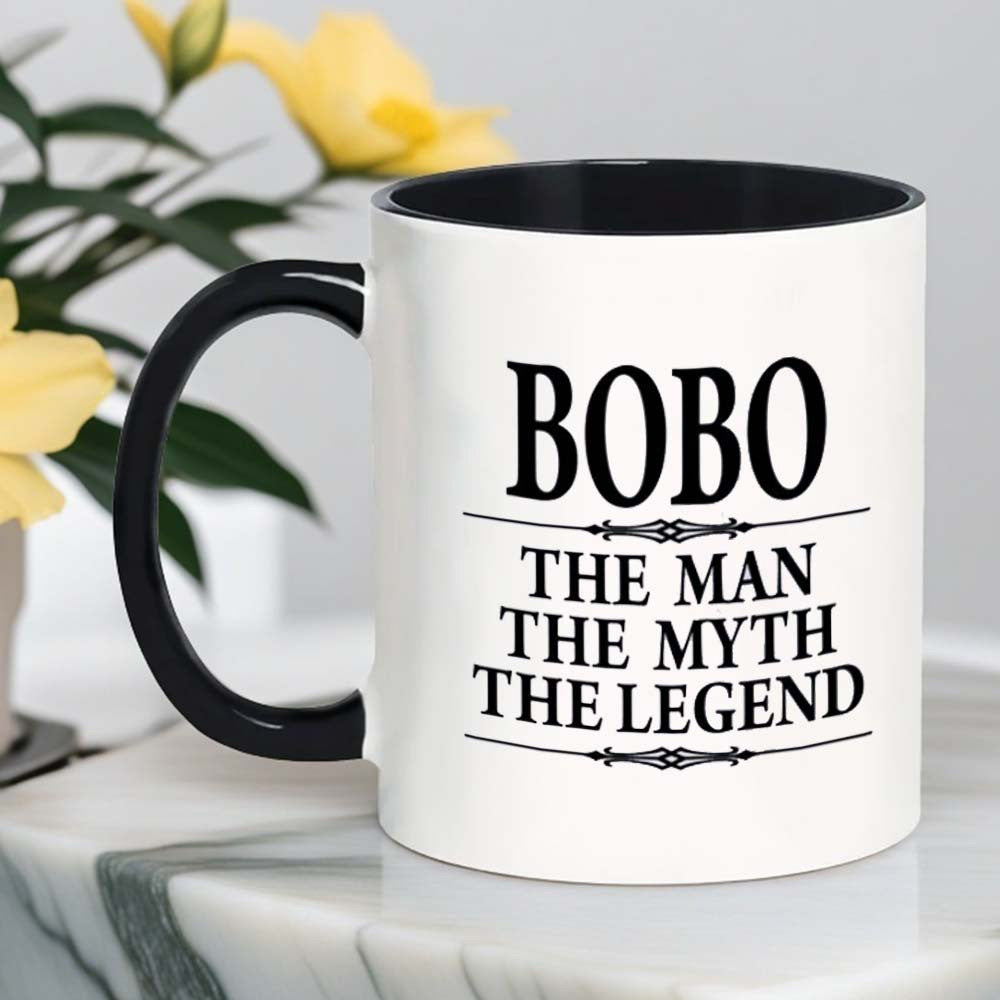 Tailorly Black Accent 11 oz Mug - bobo legend text and cartoon character