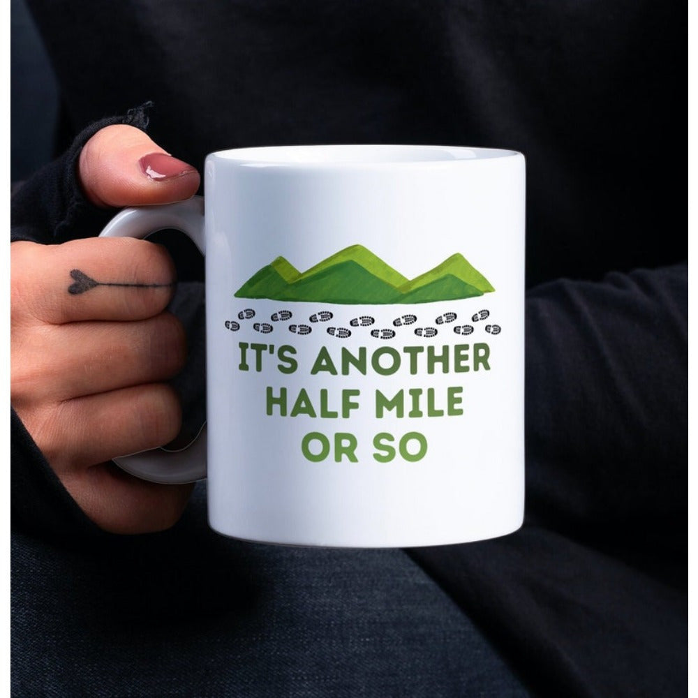 Tailorly White Ceramic 11 oz Mug - Its Another Half Mile Or So Minimalist Green Rolling Peaks With Small Footprints Beneath The Scenic Peaks Mountain