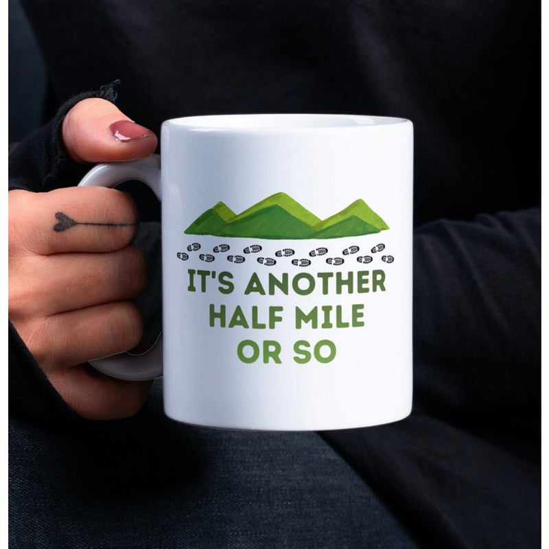 Tailorly White Ceramic 11 oz Mug - Its Another Half Mile Or So Minimalist Green Rolling Peaks With Small Footprints Beneath The Scenic Peaks Mountain