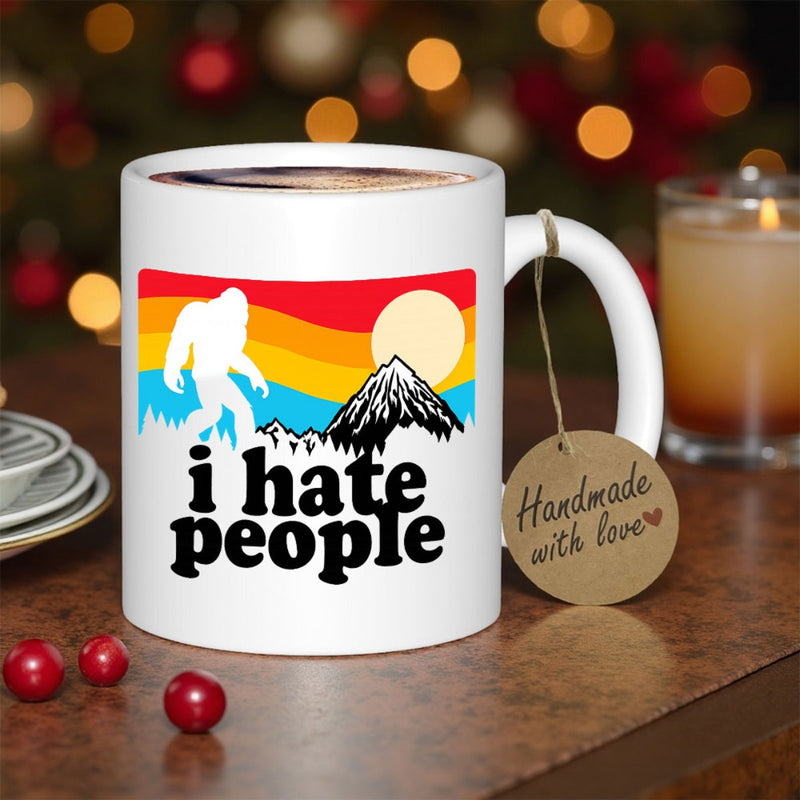 Tailorly White Ceramic 11 oz Mug - I Hate People Retro Sunset Stripes Behind Snowy Mountains With A Walking Silhouette Bigfoot