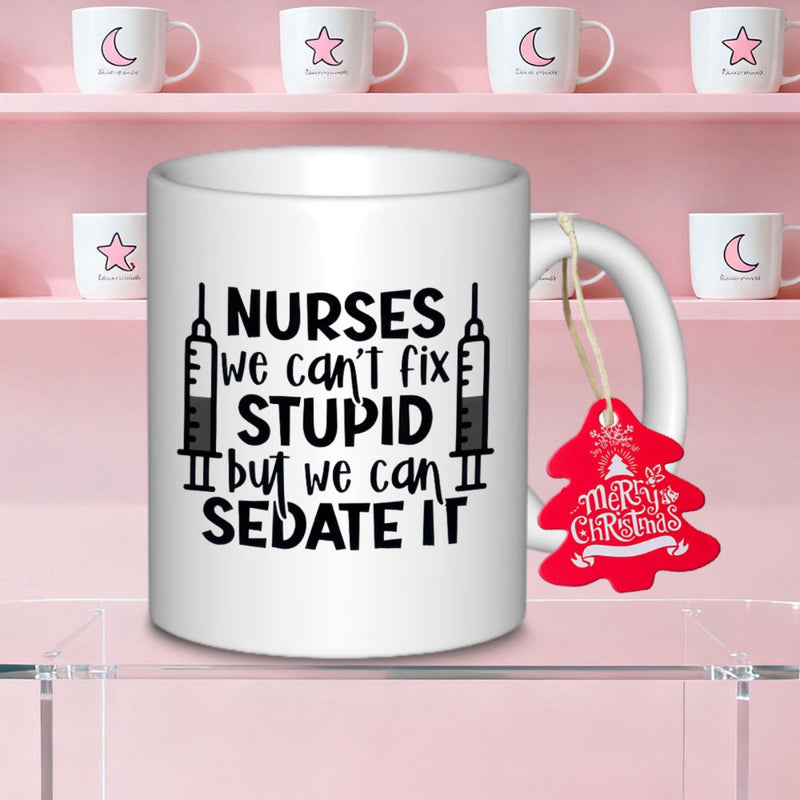 Tailorly White Ceramic 11 oz Mug - Nurses We Can't Fix Stupid But We Can Sedate It Symmetric Syringes Flanking Bold Black Professional Typography Design Mug
