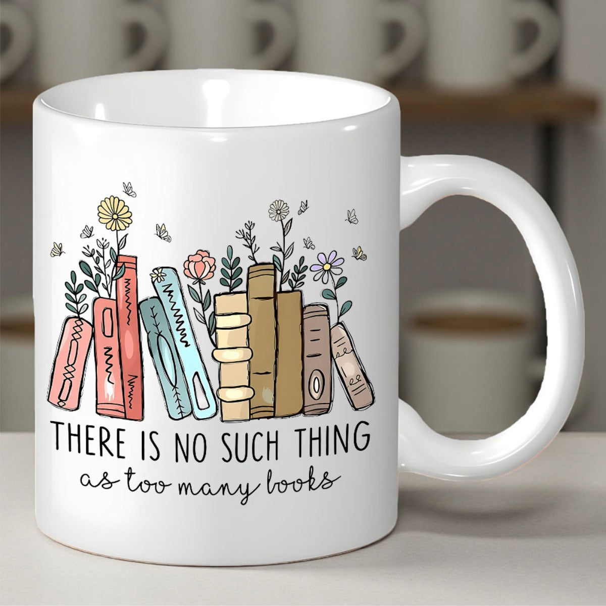 Tailorly White Ceramic 11 oz Mug - There Is No Such Thing As Too Many Books Delicate Pastel Flowers Blooming Above A Hand Drawn Stacked Library Books