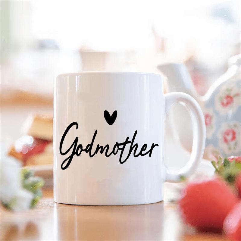 Tailorly White Ceramic 11 oz Mug - Godmother Simple Black Heart Resting Above Elegant Cursive Script Mug