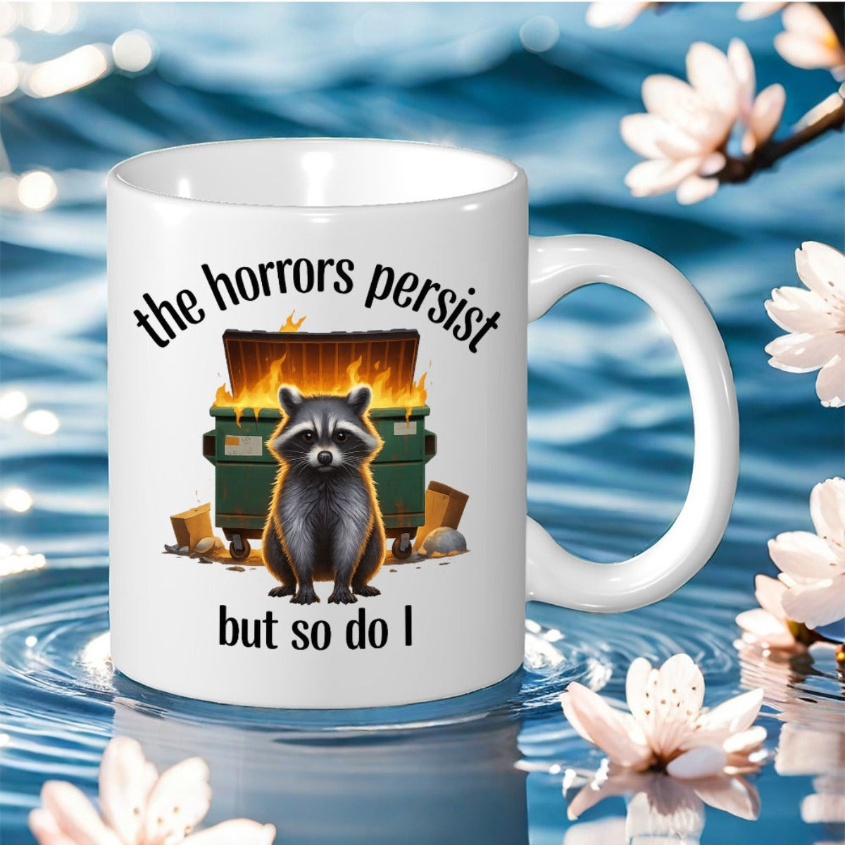 Tailorly White Ceramic 11 oz Mug - The Horrors Persist But So Do I Determined Small Raccoon Resting Before A Blazing Green Metal Garbage Bin Raccoon