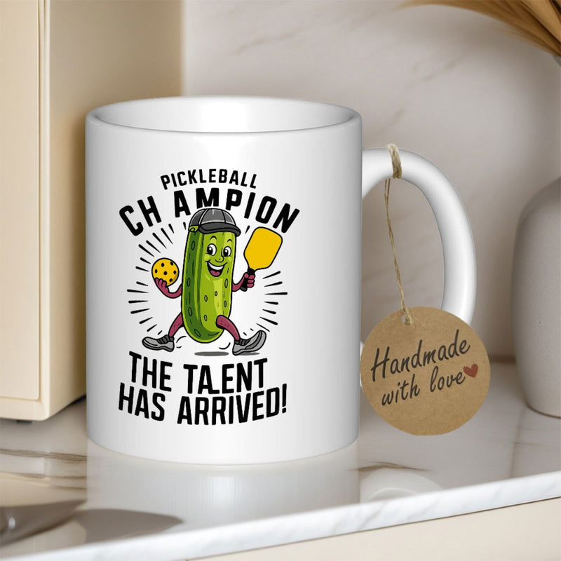 Tailorly White Ceramic 11 oz Mug - Pickleball Champion The Talent Has Arrived Energetic Cartoon Character Holding A Paddle And Ball Wearing Shoes Pickle
