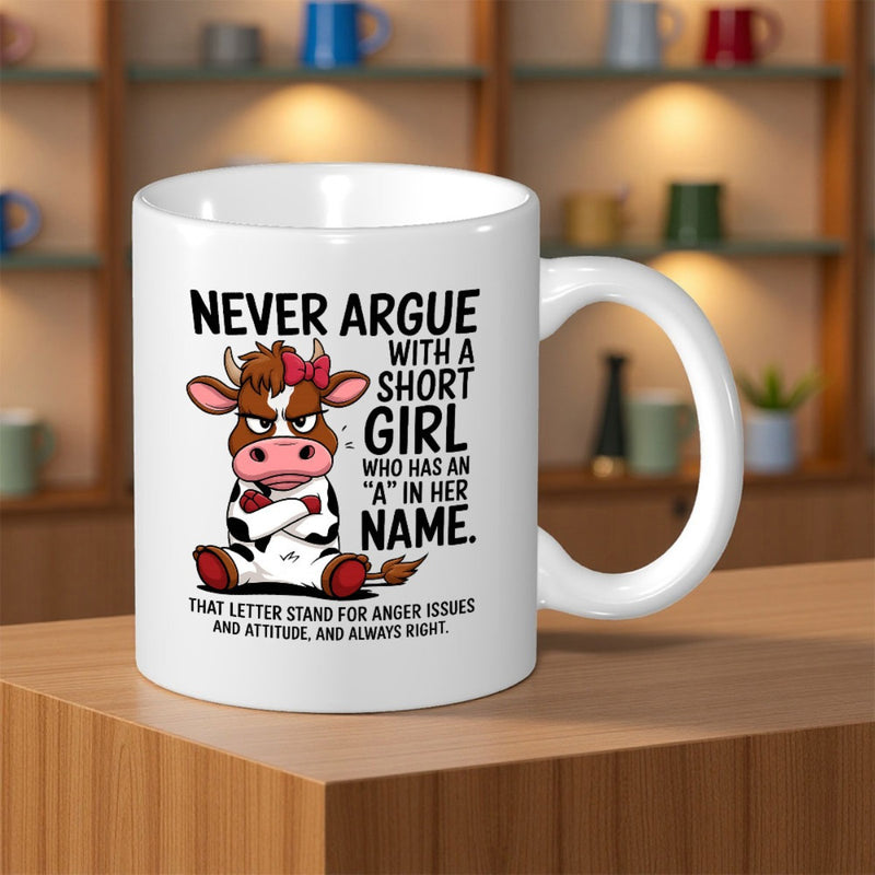 Tailorly White Ceramic 11 oz Mug - Never Argue With A Short Girl Who Has An A In Her Name Grumpy Spotted Cartoon Animal With Pink Bow And Crossed Arms Cow