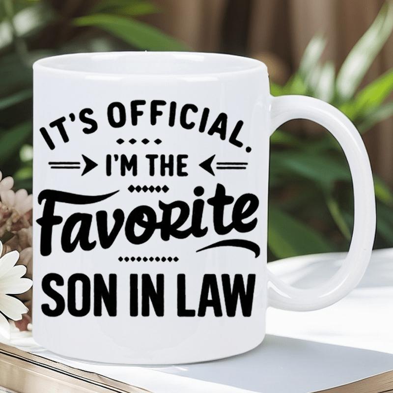 Tailorly White Ceramic 11 oz Mug - Its Official Im The Favorite Son In Law Classic Ceramic Vessel Featuring Bold Black Typography And Decorative Arrow Accents Mug