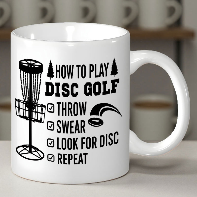 Tailorly White Ceramic 11 oz Mug - How To Play Disc Golf Throw Swear Look For Disc Repeat Minimalist Black Illustration Of A Forest Target And Flying Disc Basket