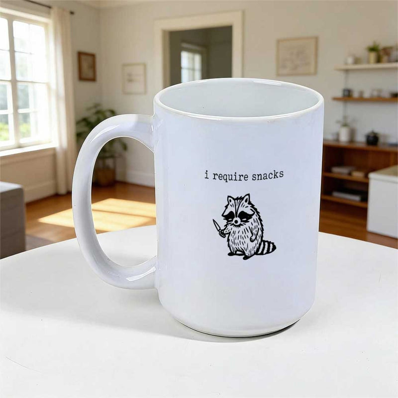Tailorly White Ceramic 11 oz Mug - I Require Snacks Small Hand Drawn Style Holding A Sharp Knife Raccoon