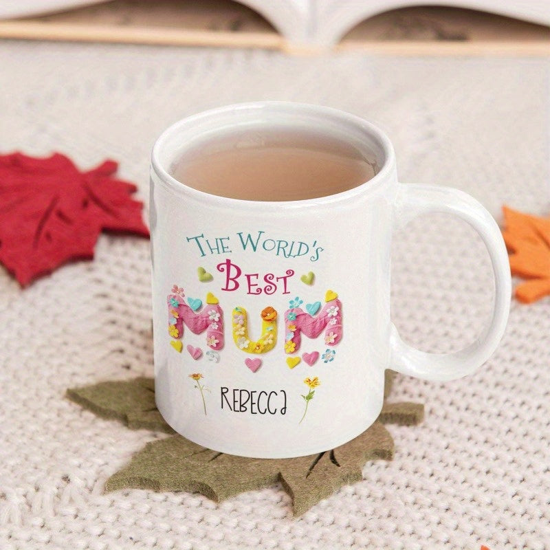 Tailorly White Ceramic 11 oz Mug - The Worlds Best Mum Rebecca Decorative Floral Letters Surrounded By Tiny Hearts And Delicate Yellow Blossoms Mug