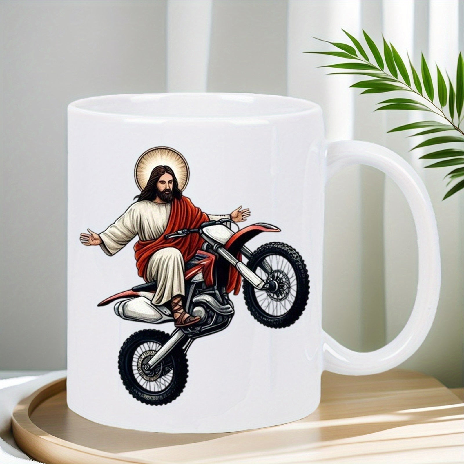Tailorly White Ceramic 11 oz Mug - Holy Figure In Robes Riding A Red Stunt Dirt Bike