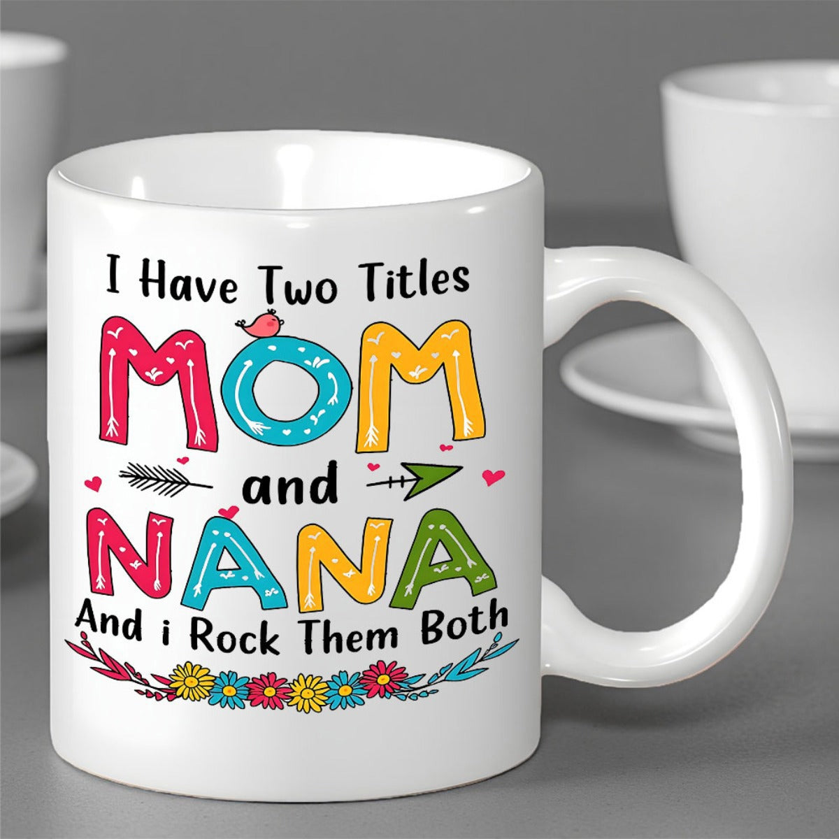 Tailorly White Ceramic 11 oz Mug - I Have Two Titles Mom And Nana And I Rock Them Both Colorful Artistic Bubble Lettering With Blooming Garden Flowers And Arrows