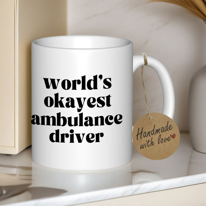 Tailorly White Ceramic 11 oz Mug - Worlds Okayest Ambulance Driver Bold Black Serif Lettering Style Minimalist Modern Typography Text