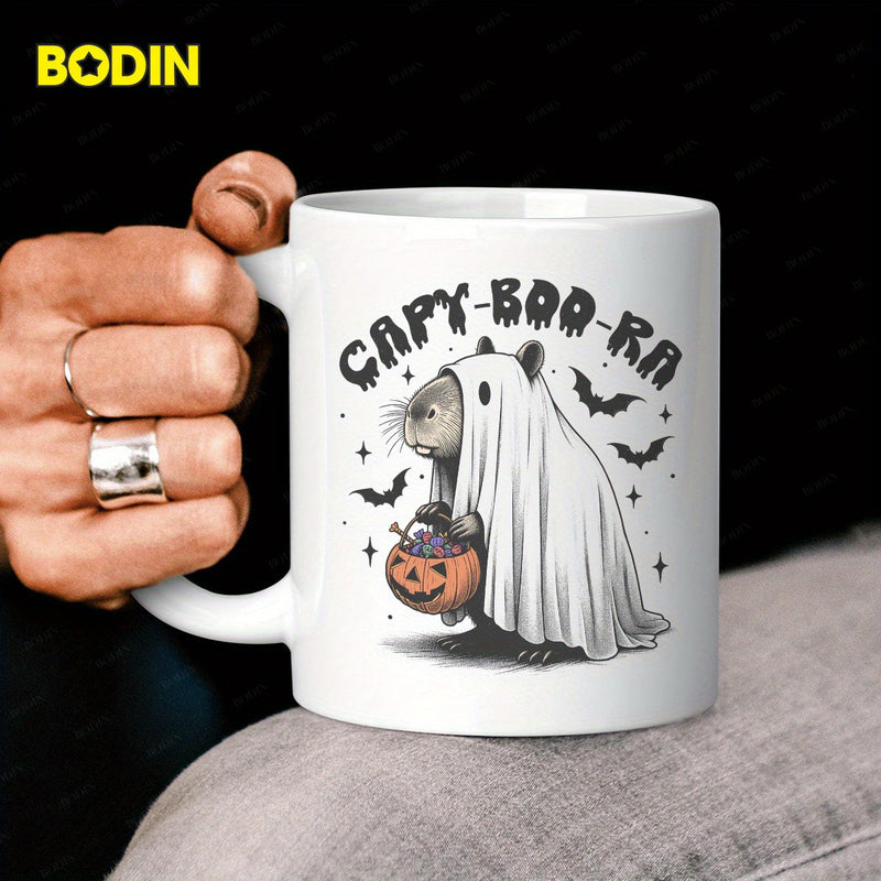 Tailorly White Ceramic 11 oz Mug - Capy Boo Ra Adorable Ghost Capybara Carrying Halloween Pumpkin Bucket Surrounded By Bats Capybara