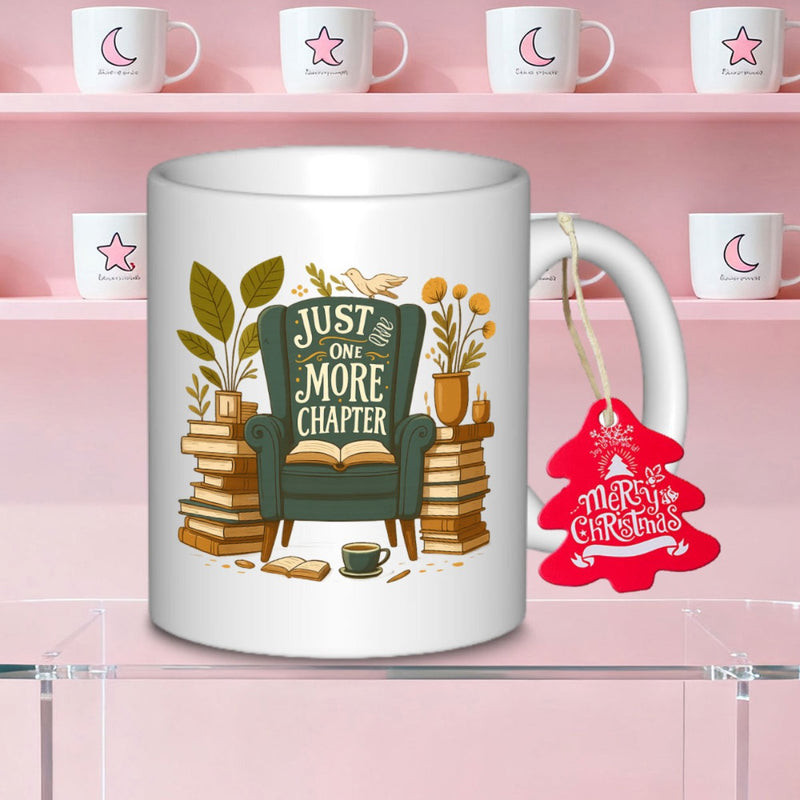 Tailorly White Ceramic 11 oz Mug - Just One More Chapter Cozy Armchair Surrounded By Stacks Of Books And Potted Plant Chair