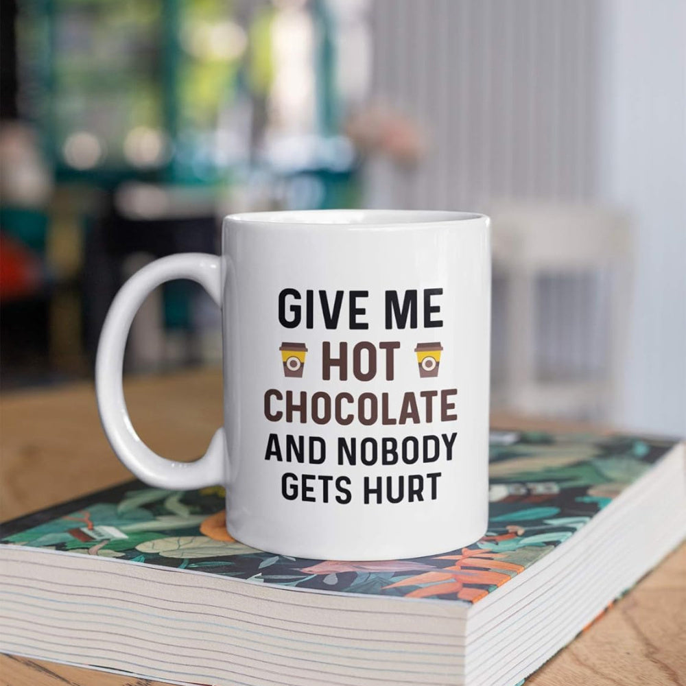 Tailorly White Ceramic 11 oz Mug - Give Me Hot Chocolate And Nobody Gets Hurt Classic Displaying Two Small Paper Cups And Bold Letters Mug