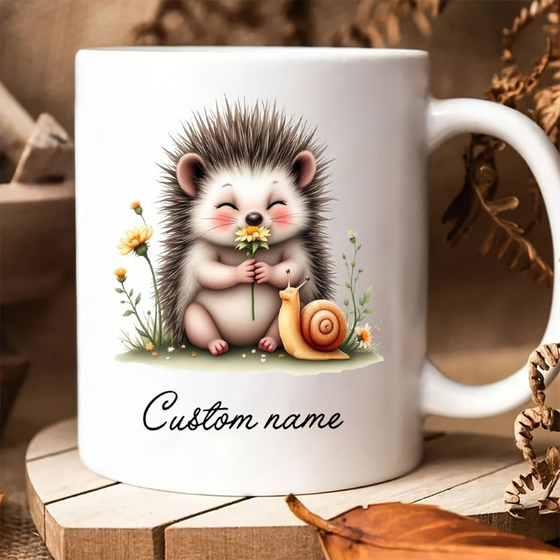Tailorly White Ceramic 11 oz Mug - Custom Name Adorable Prickly Creature Holding Delicate Yellow Flower Beside Tiny Snail Hedgehog