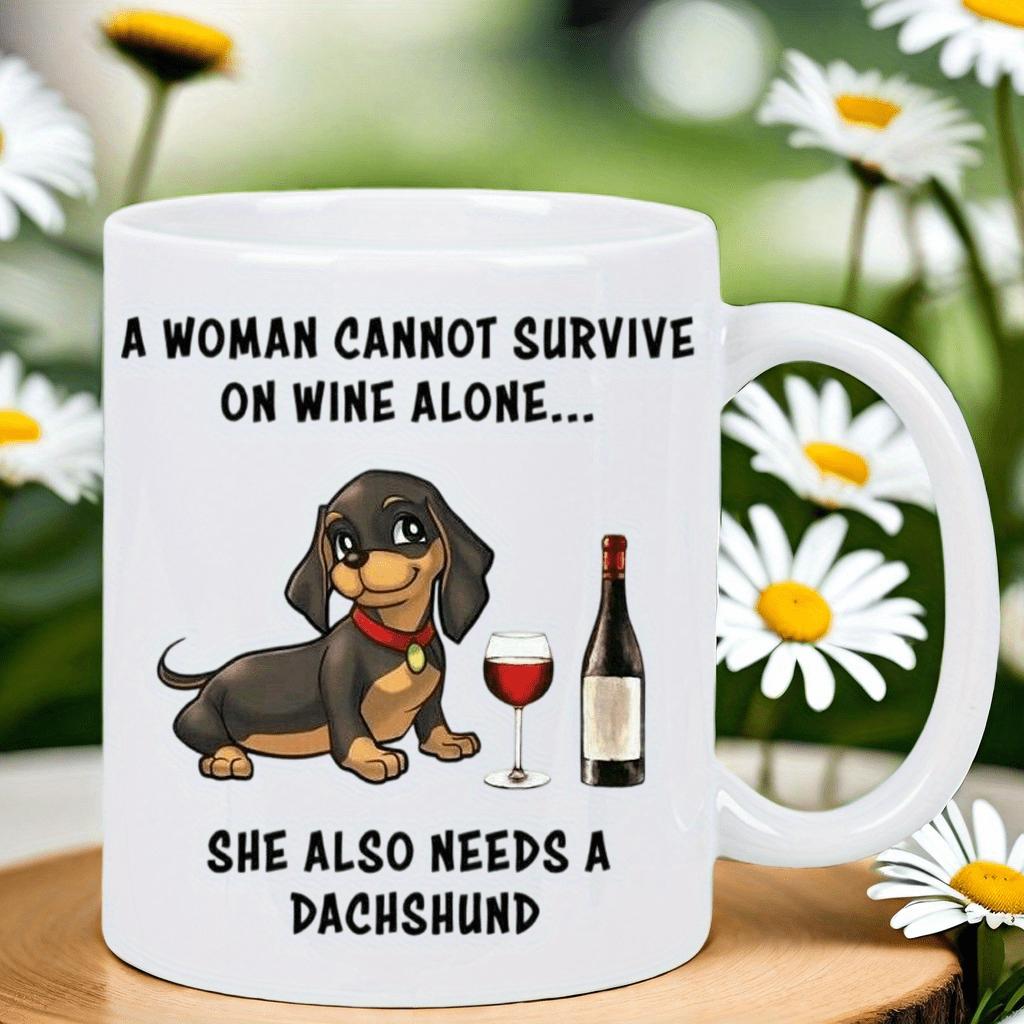 Tailorly White Ceramic 11 oz Mug - A Woman Cannot Survive On Wine Alone She Also Needs A Dachshund Cartoon Puppy Sitting Beside Elegant Bottle And Glass Of Wine