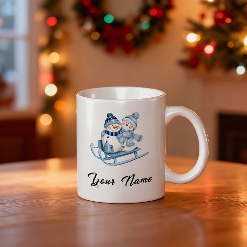 Tailorly White Ceramic 11 oz Mug - Your Name Two Cute Smiling Figures Riding On A Blue Winter Sleigh Snowmen