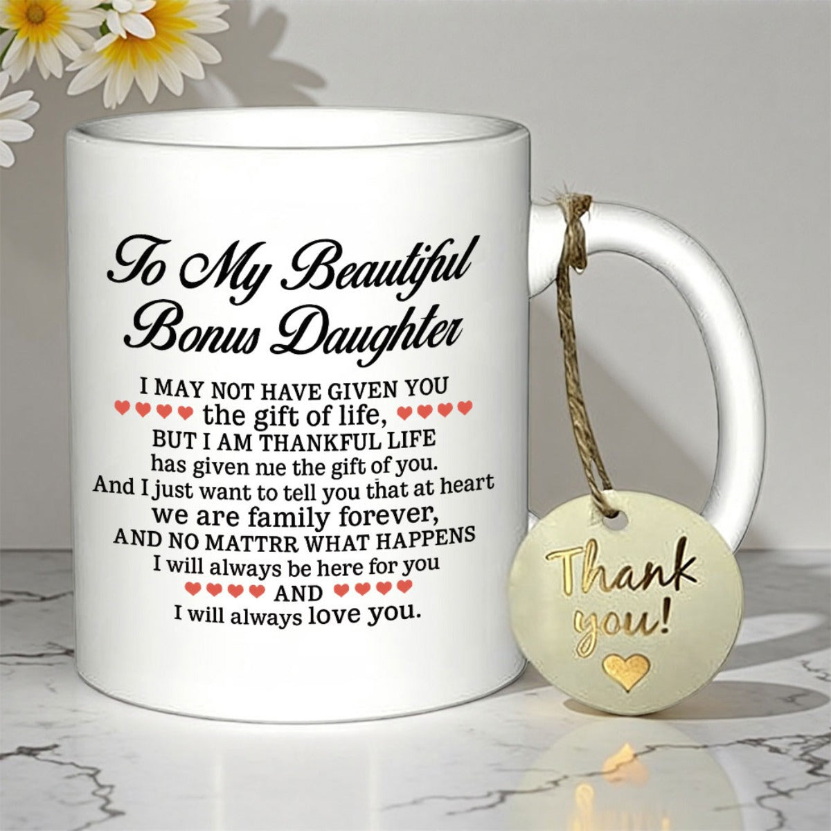 Tailorly White Ceramic 11 oz Mug - To My Beautiful Bonus Daughter Elegant Ceramic Surface With Heart Pattern And Decorative Tag Beside Floral Background Mug