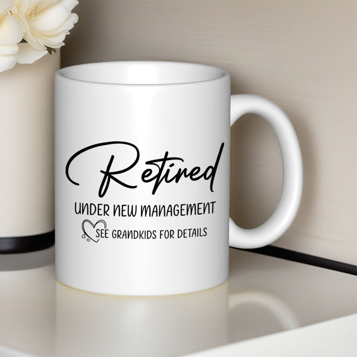 Tailorly White Ceramic 11 oz Mug - Retired Under New Management See Grandkids For Details Minimalist White Ceramic Vessel Displaying Artistic Black Script