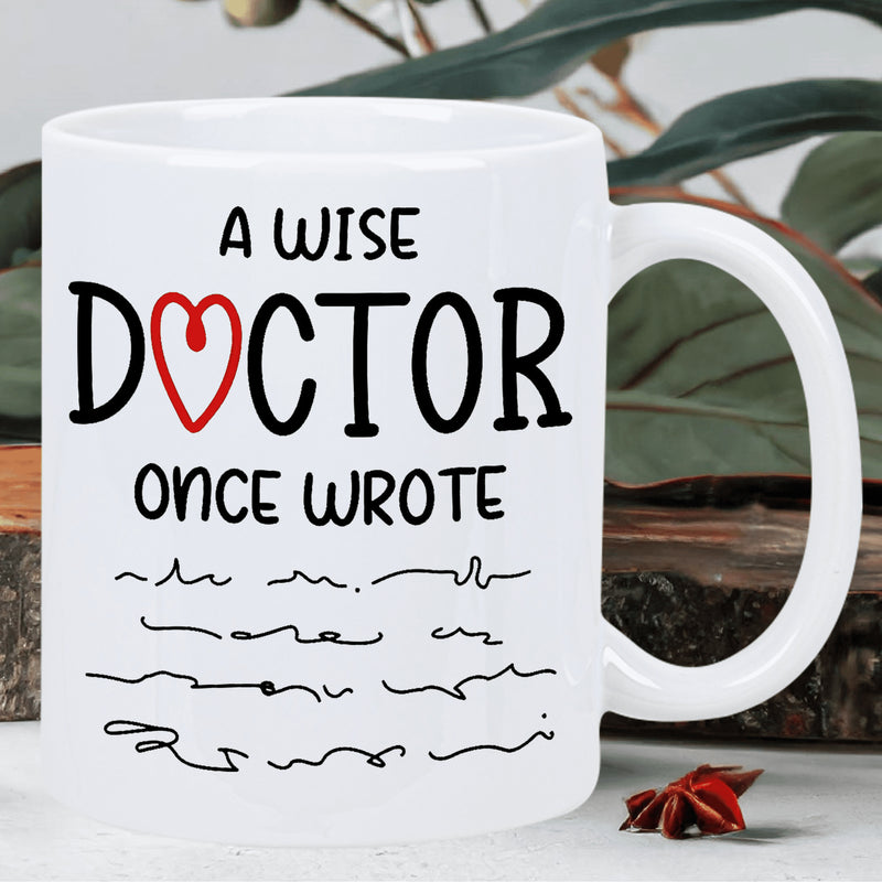 Tailorly White Ceramic 11 oz Mug - A Wise Doctor Once Wrote Minimalist Black Lettering Combined With Red Heart Shape And Scribble Design Sign
