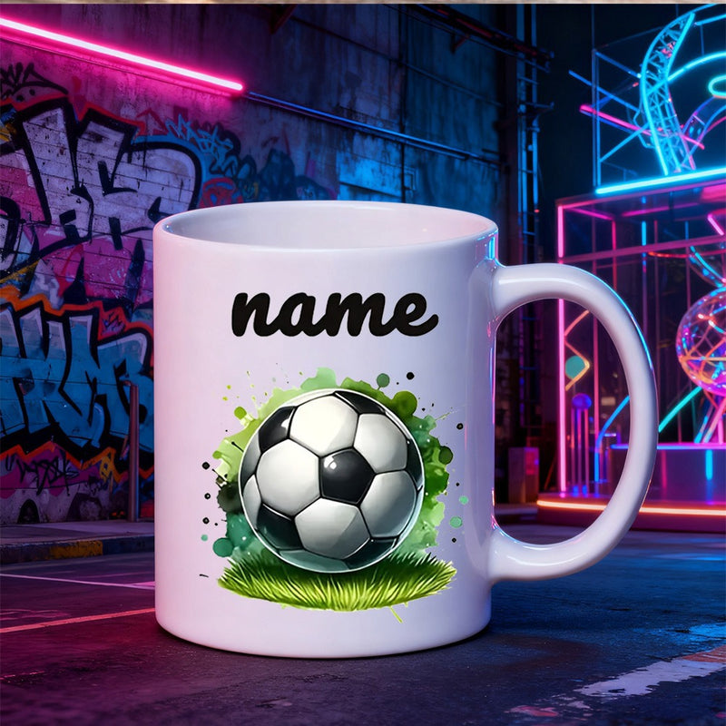 Tailorly White Ceramic 11 oz Mug - Name Classic Resting On Vibrant Green Grass Among Artistic Splashes Soccer Ball