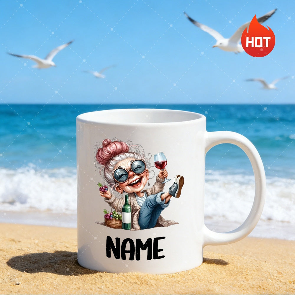 Tailorly White Ceramic 11 oz Mug - Name Cheerful Cartoon Grandmother Enjoying Red Wine Beside A Sandy Coastal Beach Woman