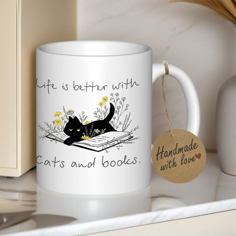 Tailorly White Ceramic 11 oz Mug - Life Is Better With Cats And Books Minimalist Black Feline Resting On Open Book Surrounded By Delicate Wildflowers Cat