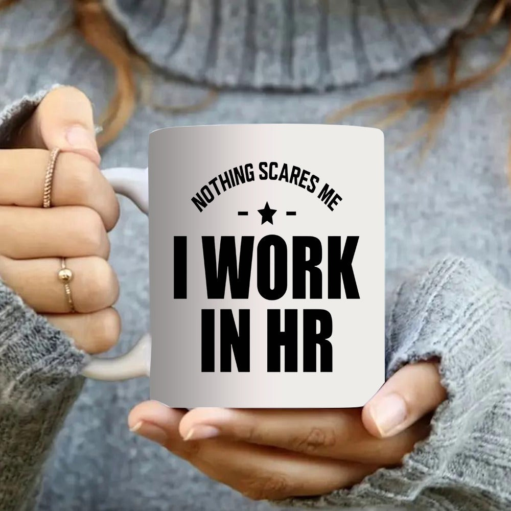 Tailorly White Ceramic 11 oz Mug - Nothing Scares Me I Work In Hr Simple Clean White Ceramic Held By Hands Featuring Bold Black Text Mug