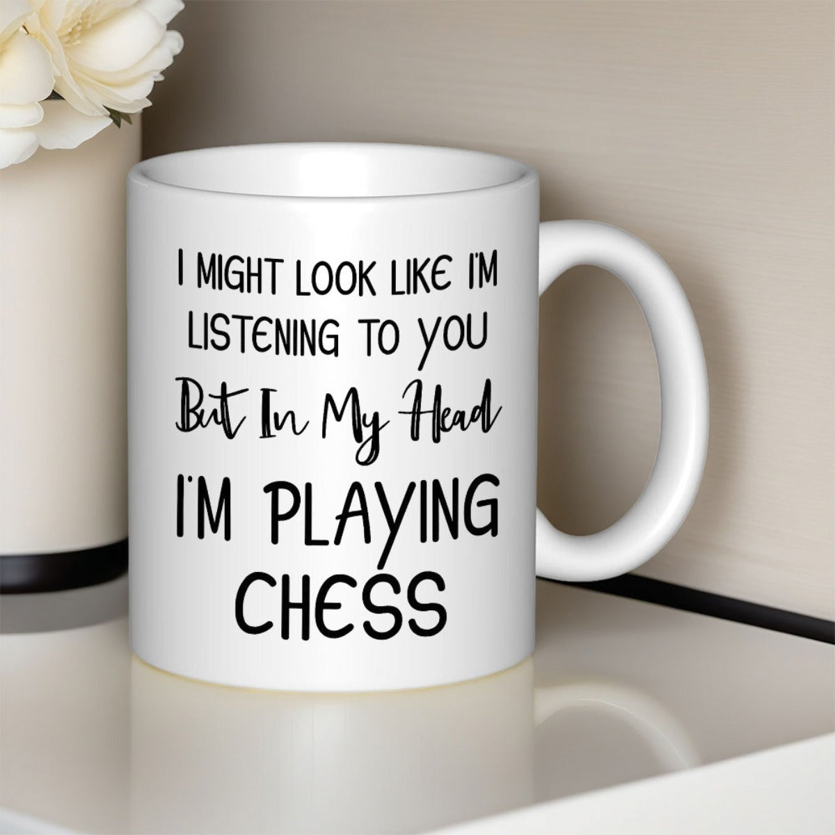 Tailorly White Ceramic 11 oz Mug - I Might Look Like Im Listening To You But In My Head Im Playing Chess Simple Elegant Black Lettering Over A White Surface Mug