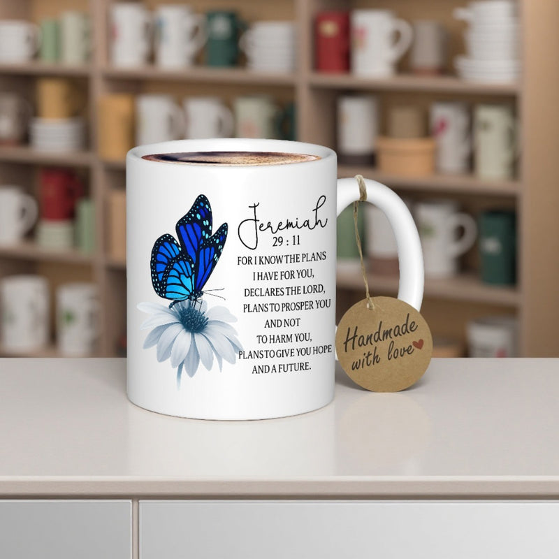 Tailorly White Ceramic 11 oz Mug - Jeremiah 29 11 Vibrant Blue Wings Resting Gently On A Soft White Blooming Petal Butterfly