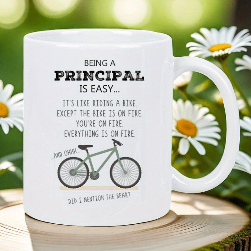 Tailorly White Ceramic 11 oz Mug - Being A Principal Is Easy Minimalist Black Frame Two Wheeled Vehicle Resting On White Bicycle