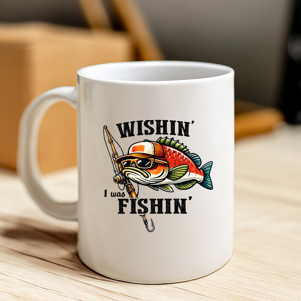 Tailorly White Ceramic 11 oz Mug - Wishin I Was Fishin Stylized Cartoon Bass Wearing Sunglasses And Trucker Hat Holding Rod Fish