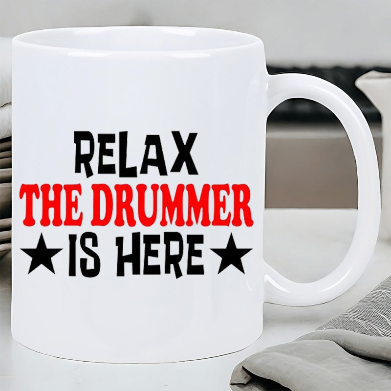 Tailorly White Ceramic 11 oz Mug - Relax The Drummer Is Here Bold Red And Black Text Between Minimalist Stars Mug