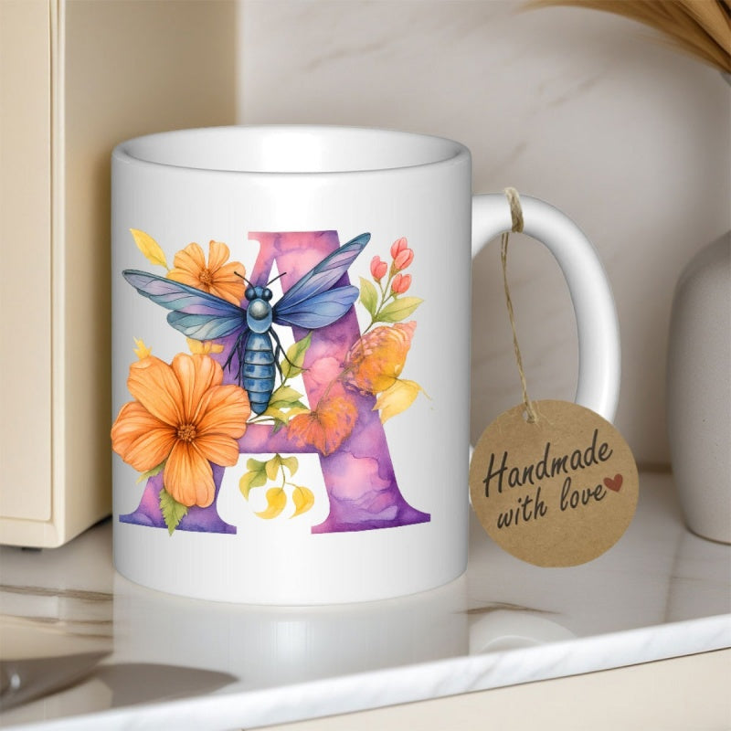 Tailorly White Ceramic 11 oz Mug - A Vibrant Watercolor Orange Flowers Blooming Around Large Purple Letter Butterfly