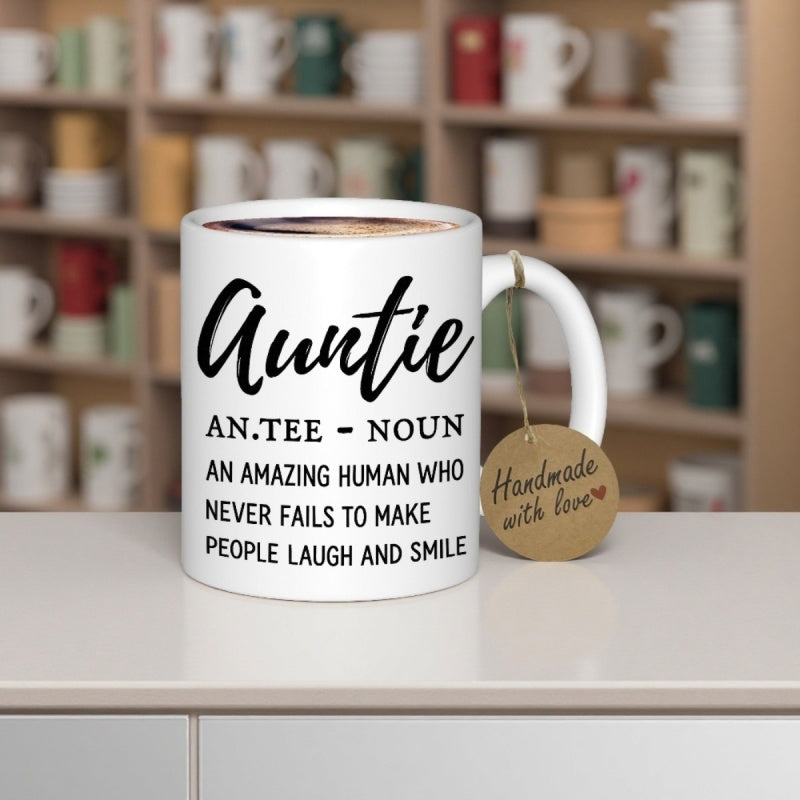 Tailorly White Ceramic 11 oz Mug - Auntie An Tee Noun An Amazing Human Who Never Fails To Make People Laugh And Smile Elegant Black Script Font Arranged On A Clean
