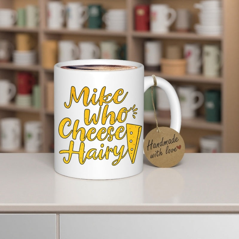 Tailorly White Ceramic 11 oz Mug - Mike Who Cheese Hairy Yellow Wedge With Holes Floating Beside Bold Golden Cursive Cheese