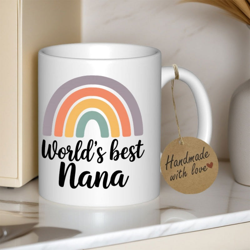 Tailorly White Ceramic 11 oz Mug - Worlds Best Nana Soft Pastel Rainbow Arches Rising Over Elegant Flowing Script Styled Text Rainbow