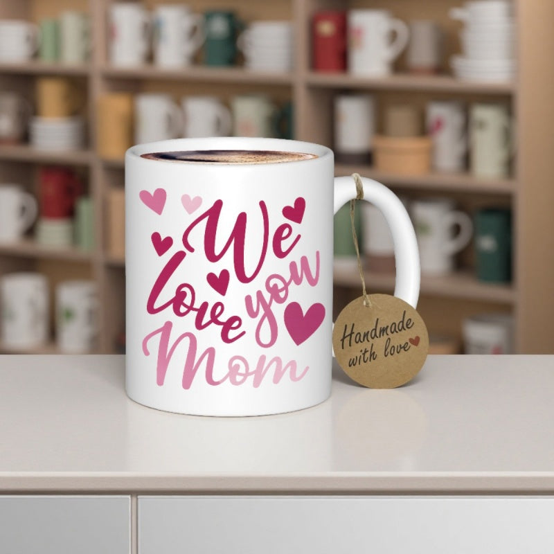 Tailorly White Ceramic 11 oz Mug - We Love You Mom Handmade With Love Vibrant Pink And Purple Hearts Floating In A Gentle Decorative Pattern Heart